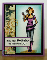 Purple framed card with a teal panel, the girl in a plum top holding a glass of wine, and 'may your birthday be filled with JOY' on a white strip.