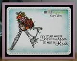 Framed card with the flower-basket bicycle on a soft blue inked panel, stamped 'IT'S NOT ABOUT THE Destination IT'S ABOUT THE Ride.'
