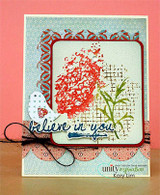 Card with a coral-red hydrangea bloom stamped over a brown grid texture with green stems, blue patterned papers, a little bird and twine bow, sentiment 'believe in you'.