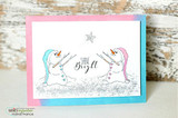 Card with two snowmen holding a star and 'Shine Bright.'