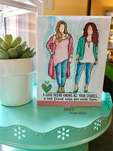 Card with the two friends beside a small succulent and the 'good friend' sentiment.