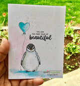 Soft watercolor card with the penguin and a teal heart balloon, 'You are the best kind of beautiful.'