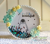 Round shaker card with the penguin and a teal heart balloon, 'You are the best kind of beautiful.'
