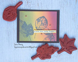 Card with leaves over a rainbow-inked panel, 'true love lasts forever'