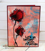Card with a coral and turquoise blended panel on a red base, two poppies coloured in deep crimson with black splatters and "Life is better with friends" stamped at the bottom.