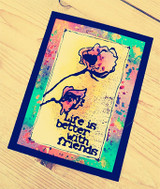 Mixed media card in yellow, teal and pink with a navy frame, the poppies stamped in black over the blended background and "Life is better with friends" lettered in the corner.