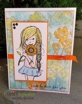 A soft floral card with the girl colored in blonde and pale blue on a white panel, over an orange ribbon, with the sentiment 'i will be there for you.'