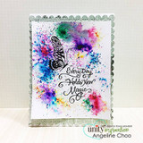 White scalloped card with rainbow ink blooms in pink, purple, teal and blue, a black half butterfly and 'Every Day Holds New Magic'.