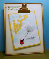 Blue card with the dandelion and ladybug and gold hexagon accents, 'sending beautiful wishes.'