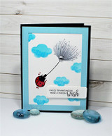Soft blue card with the dandelion, ladybug and clouds, 'sending beautiful wishes.'