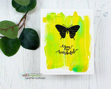 A single black butterfly stamped over a vivid yellow-green paint smear on a white card, captioned 'You are Wonderful.'