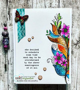 Card with the vividly colored floral feather on weathered wood and a note about the sheer amazingness of it all.