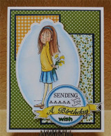 Green polka dot and plaid card: the girl in a yellow sweater and blue skirt holding yellow flowers behind her back in an oval frame with a circle sentiment badge.