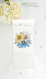 Minimal white card with a small cluster of blue and yellow sunflowers popped up in the center.