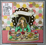 Card with the crafty girl colored at her supply-covered table, 'To my crafty friend with love,' 'on your special day.'