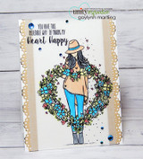 Card with the wreath girl in muted tones on a woodgrain panel.
