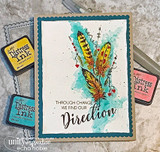 Card with the feathers in yellow and teal over a teal watercolour panel with red hearts and the through change we find our direction sentiment, styled with ink pads.