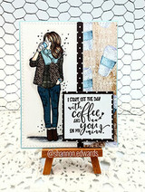 Card with the girl on a mini easel over chicken-wire and 'I start off the day with coffee and you on my mind.'
