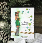 White card with a flapper girl colored in green and teal, surrounded by teal and mint enamel dots, stamped 'Classy but I cuss a little'.