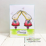 Handmade card with two bunnies mirrored to lean toward one another, with "I am really missing you," created with the Mirror Stamping Tool.