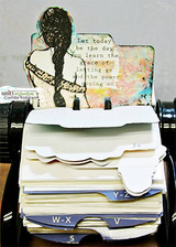 Mixed-media piece with the braided girl over vintage cards, stamped 'Let today be the day you learn the grace of letting go.'