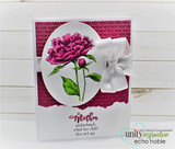 Card with a deep magenta peony on a white oval, white ribbon, and 'Mother understands what her child does not say.'