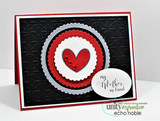 Dramatic black card with a red enamel heart in scalloped circles and 'my Mother, my friend.'