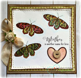 Framed card with green and pink butterflies and a heart button, 'Mother is another name for love.'