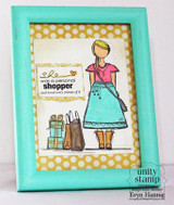 Card in a turquoise frame with the girl in a pink top and teal skirt on yellow polka-dot paper beside gifts, with the personal shopper sentiment.
