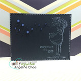 The dandelion girl stamped in white on a black panel over striped paper with 'every breath is a gift.'