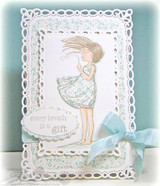 The dandelion girl colored softly inside an intricate white die-cut frame with 'every breath is a gift.'