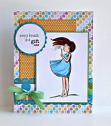 The dandelion girl in a blue dress on a colorful patterned card with 'every breath is a gift.'