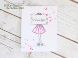 Card with the girl in a pink skirt holding a sign stamped 'I Love You' on a clean white panel with pink accents.