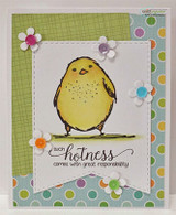 Yellow bird on a stitched white panel with paper flowers over green and polka-dot papers, sentiment 'such hotness comes with great responsibility'