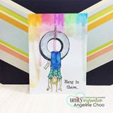 Rainbow striped gatefold card in pastel pink, yellow, green and blue with the tire swing girl in a blue shirt, and "Hang in there..." stamped at her side.