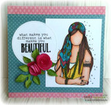 Teal polka-dot card with Indie Girl in a green and turquoise top, red fabric roses, and 'what makes you different is what makes you beautiful' in a white circle.