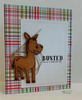 A colored donkey on a plaid card with a stitched white panel — the cheeky sentiment 'BUSTED my ass to make this card.'