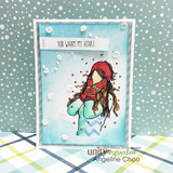 The winter girl in a red hat and scarf on a snowy dotted card with 'You warm my heart.'
