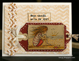 Soft neutral card with lace trim and a stamped tag of the seated beach girl, topped by a strip reading 'Even though We're far apart'.
