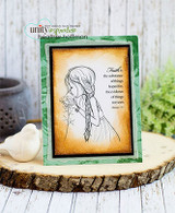The braided girl stamped in outline on a kraft panel framed in green with a faith sentiment on the sample.