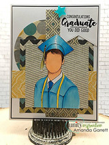 Grad in a blue gown, 'Congratulations Graduate you did good,' on a patterned card.
