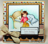 Card with the girl in pink and a pale grey dog leaning in over a cream bed on a watercolor background, with the 'Light tomorrow with today.' sentiment and a cream bow on polka dot papers
