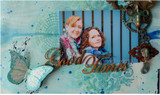 Mixed-media panel with a photo, a teal butterfly and grunge textures and a 'Good Times' word.