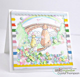 Pastel rainbow shaker card — dog and cat sitting beneath the rainbow bridge