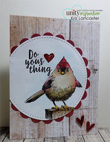 Woodgrain card with a crested songbird perched on a post, coloured cranberry and grey inside a scalloped circle, sentiment 'Do your thing'.