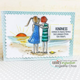 Card with the friends colored in blue and green stripes watching an orange sunset over the water, on a soft blue triangle-print panel, sentiment "KINDNESS comes in many forms but always from the heart."