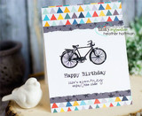 White card with a bright triangle-print strip: the bicycle stamped above “Happy Birthday, life's a journey enjoy the ride.”