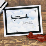 Clean card with a blue cloud-stenciled sky: the airplane in flight beside “you're just plane awesome.”