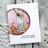 Birthday shaker card with a lemon cocktail, gold sequins, and the sentiment “Another year older. Better make it a double.”