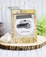 Card with the car postcard stamped inside a white circle on gold map paper, black chevron washi at the top and 'you are a classic' beneath.